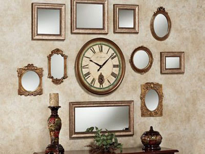 A wall with clock and some mirrors